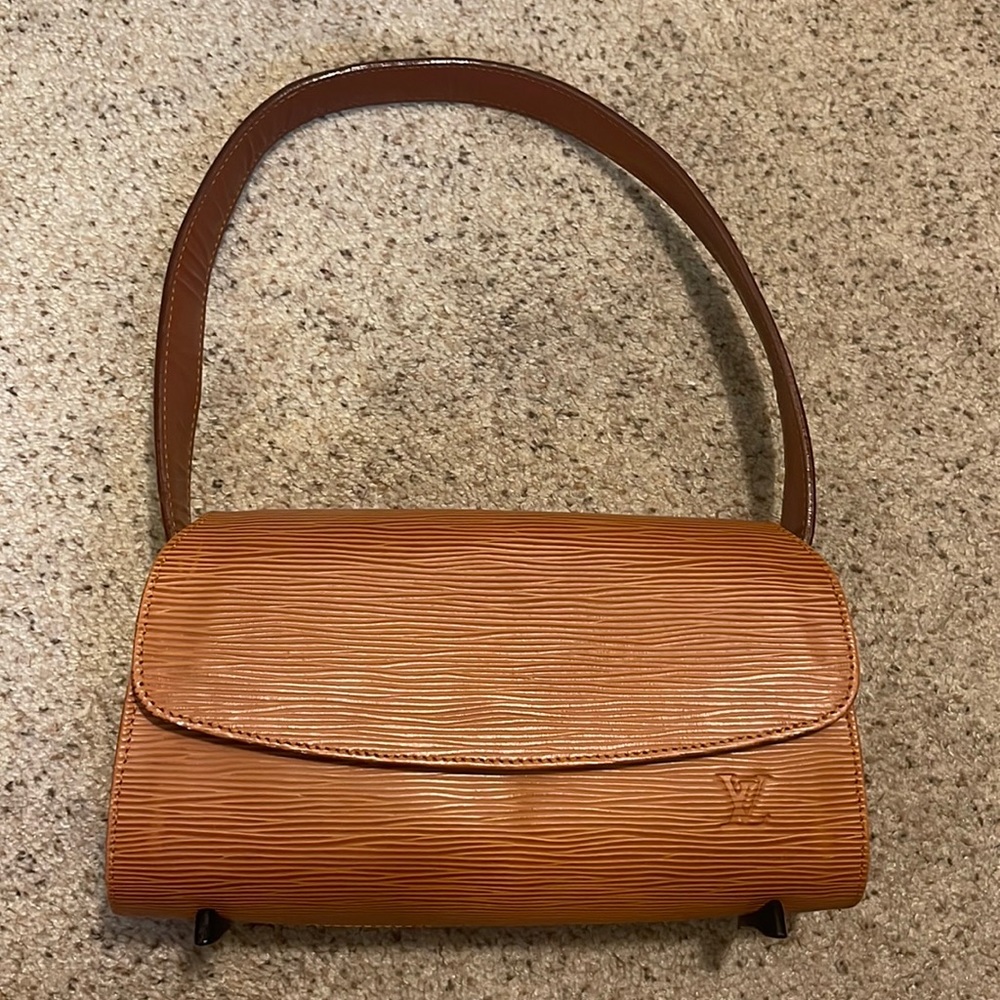 LV shoulder bag.